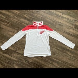 Woman’s Detroit Redwings Reebok 1/4 zip up long sleeve, large